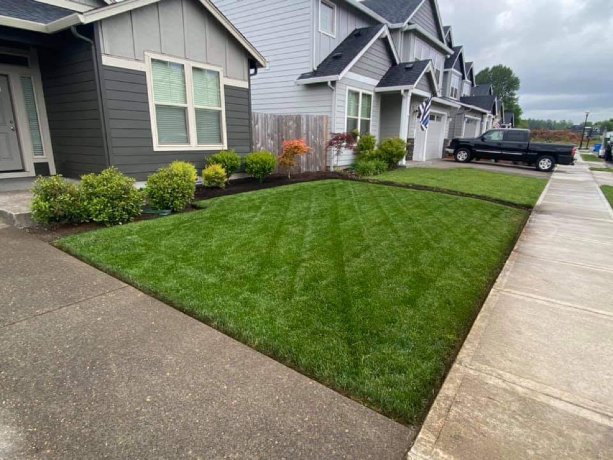 Hazen Lawn Care crew servicing a residential neighborhood
